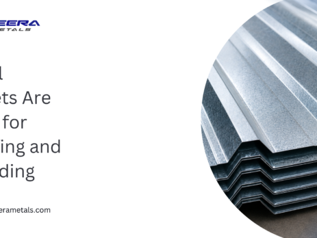 Stack of galvanized corrugated steel sheets used for industrial roofing and cladding panels by Heera Metals.